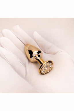 Plug LESS G (ABS) Dourado com Pedra Cravejada Dourada - Tamanho G